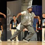 What is Popping? Exploring Hits, Waves, and Robotics in Dance