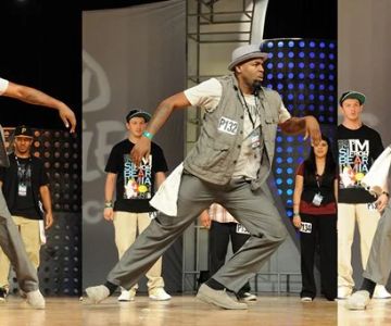 What is Popping? Exploring Hits, Waves, and Robotics in Dance